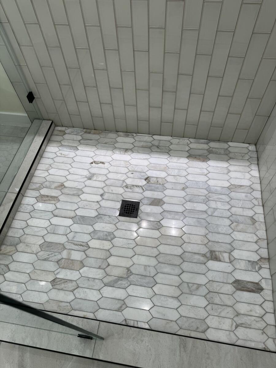 Marble hexagon mosaic shower floor